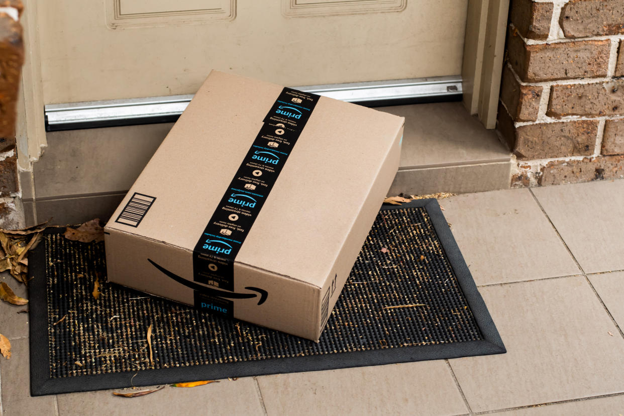 an Amazon prime box delivered to a front door of residential building, october prime day, amazon prime day, fall prime day