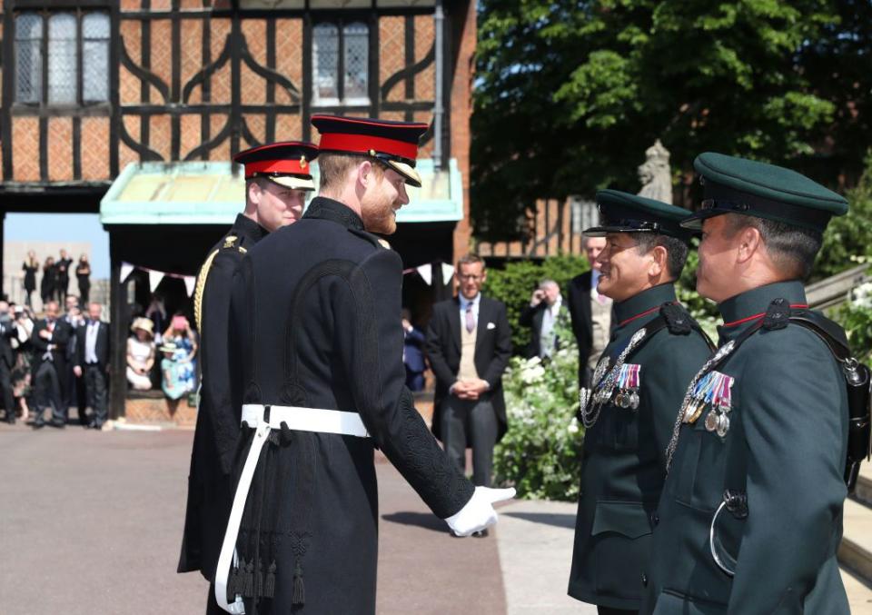 Along the way, William and Harry chat with the crowd