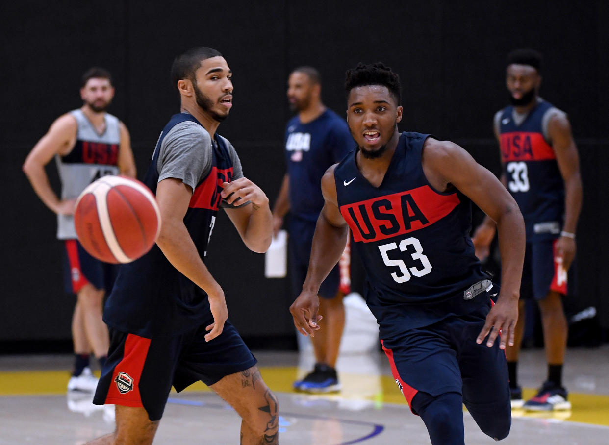 EL SEGUNDO, CALIFORNIA - AUGUST 13:  Donovan Mitchell #53 chases after his pass in front of Jayson Tatum #34 during the 2019 USA Men's National Team World Cup training camp at UCLA Health Training Center on August 13, 2019 in El Segundo, California. (Photo by Harry How/Getty Images)