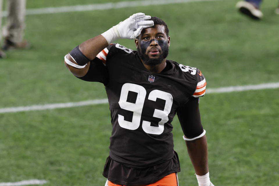 FILE - In this Oct. 11, 2020, file photo, Cleveland Browns middle linebacker B.J. Goodson (93) celebrates after the Browns defeated the Indianapolis Colts 32-23 during an NFL football game, in Cleveland. The Browns will try to earn a playoff spot without starting linebacker B.J. Goodson, who will miss the game on Sunday, Dec. 27, against the New York Jets after testing positive for COVID-19. (AP Photo/Ron Schwane, File)