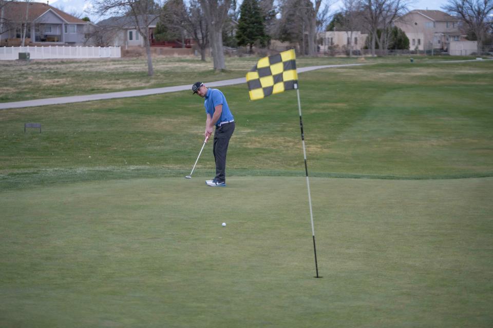 John Strait watches his putt for birdie on the 8th hole of Desert Hawk Golf Course in Pueblo West on Wednesday, March 27, 2024.