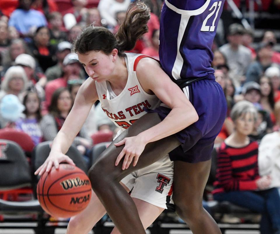 Texas Tech's guard Bailey Maupin (20) dribbles the ball against Kansas State in a Big 12 basketball game, Sunday, Feb. 5, 2023, at United Supermarkets Arena. 