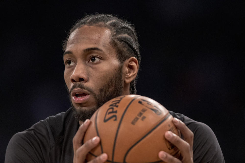 San Antonio Spurs forward Kawhi Leonard holds the basketball world in his massive hands this summer. (Getty Images)