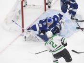 Dallas Stars defenseman Jamie Oleksiak (2) scores against Tampa Bay Lightning goaltender Andrei Vasilevskiy (88) during second-period NHL Stanley Cup finals hockey action in Edmonton, Alberta, Saturday, Sept. 19, 2020. (Jason Franson/The Canadian Press via AP)