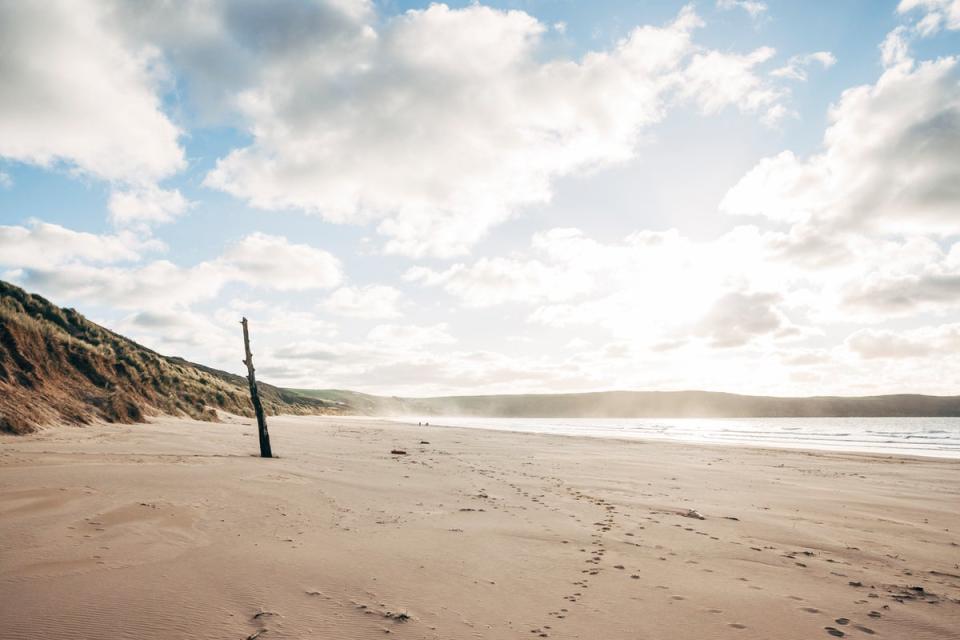 Brisk walks on Woolacombe beach is a short journey in the car from Rockham Bay View (Getty Images/iStockphoto)