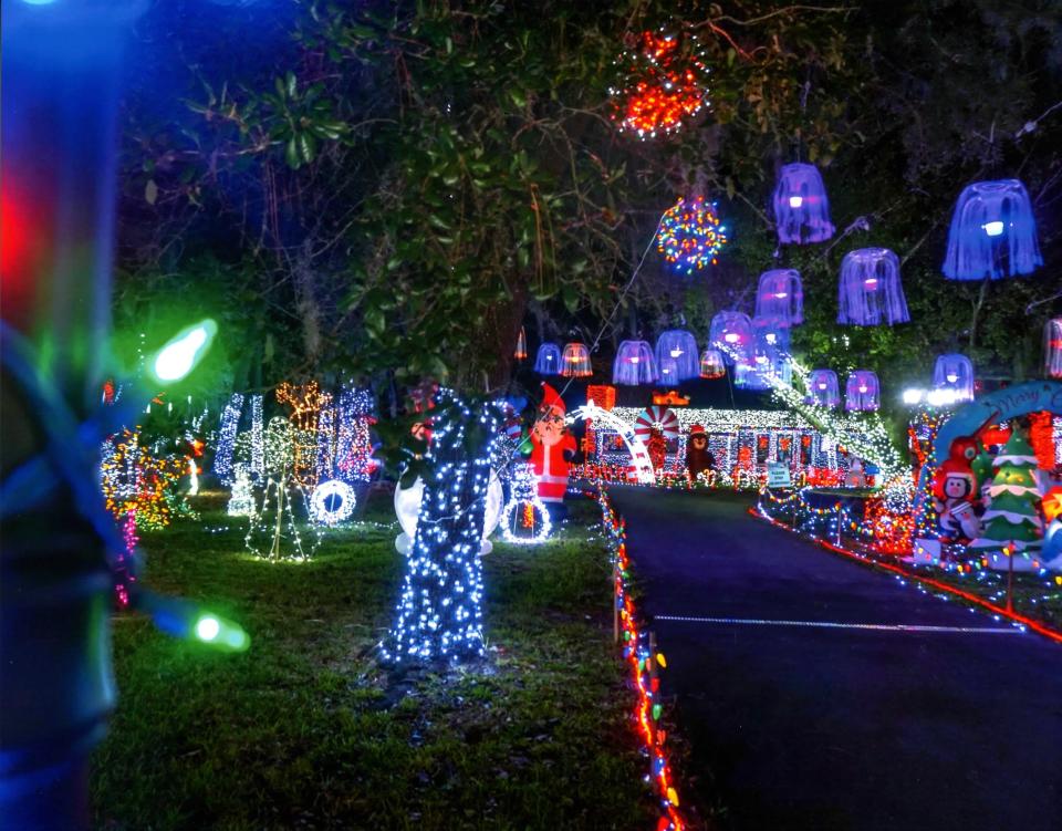 Holiday jellyfish hang over the display on Beauclerc Road.