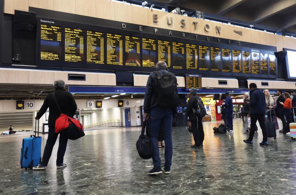 Passengers at Euston station in London (James Manning/PA) (PA Wire)