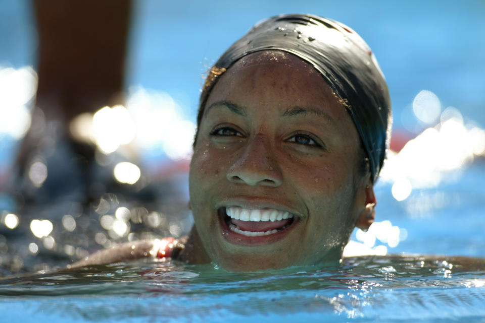 Maritza Correia smiles after swimming the 50 meter freestyle final during the US Swimming Olympic Team Trials on July 14, 2004.