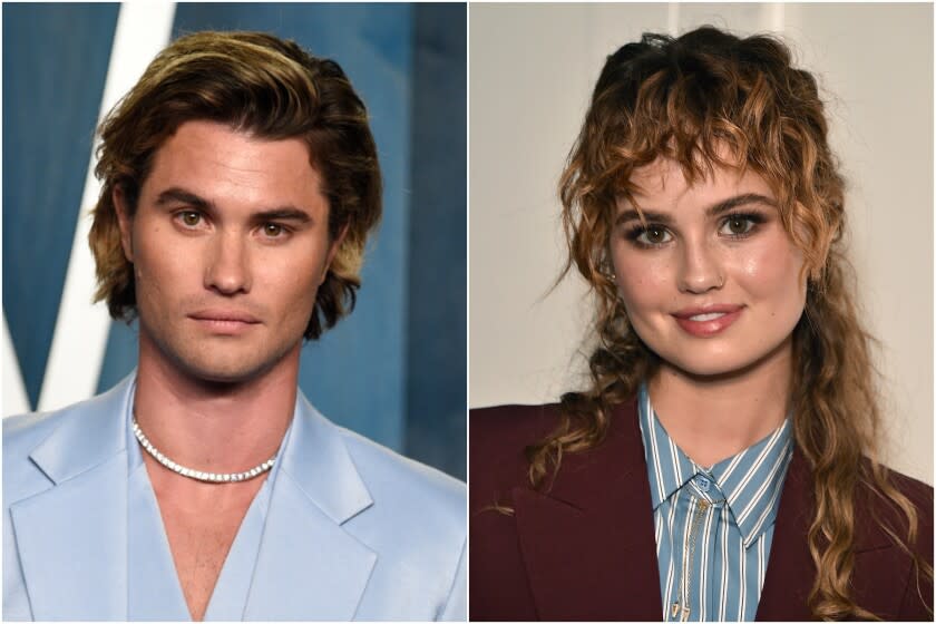 A split image of a man posing in a powder-blue suit, left, and a woman posing in a maroon suit