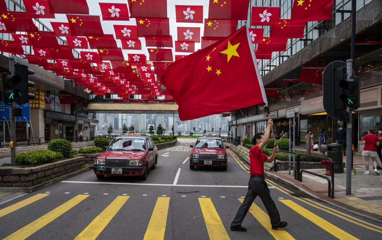 Flags on display ahead of the July 1st anniversaries of Hong Kong's handover to China and the 100th anniversary of the Chinese Communist Party - Anadolu Agency 