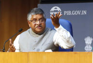 India's Information Technology Minister Ravi Shankar Prasad, addresses a press conference in New Delhi, India, Thursday, Feb. 25, 2021. India on Thursday rolled out new regulations for social media companies and digital streaming websites to make them more accountable for the online content shared on their platforms, giving the government more power to police it. (AP Photo/Manish Swarup)