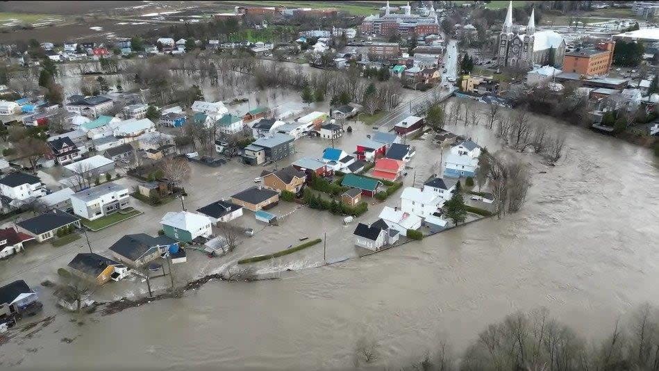 Major flooding in the Charlevoix and Lanaudière regions last year led to hundreds of people being evacuated from their homes. Floodwaters washed out roads and several motorhomes were swept away.  (Submitted by Frederick Tremblay - image credit)