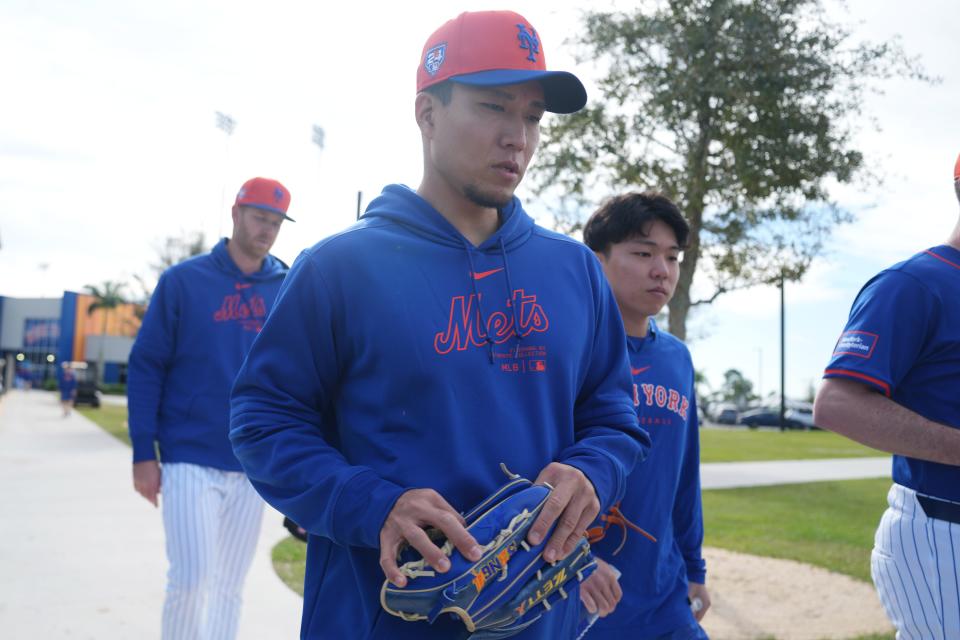 Feb 14, 2024; Port St. Lucie, FL, USA; New York Mets starting pitcher Kodai Senga (34) walks out to the practice fields during workouts at spring training. Mandatory Credit: Jim Rassol-USA TODAY Sports