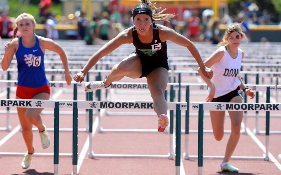 Thousand Oaks High's Lauren Thai has a look of determination during her victory in the Division 2 girls 100-meter hurdles race at the CIF-Southern Section Track and Field Championships at Moorpark High on Saturday, May 14, 2022. Thai won in 14.50 seconds and also won the 300 hurdles title in 45.08.