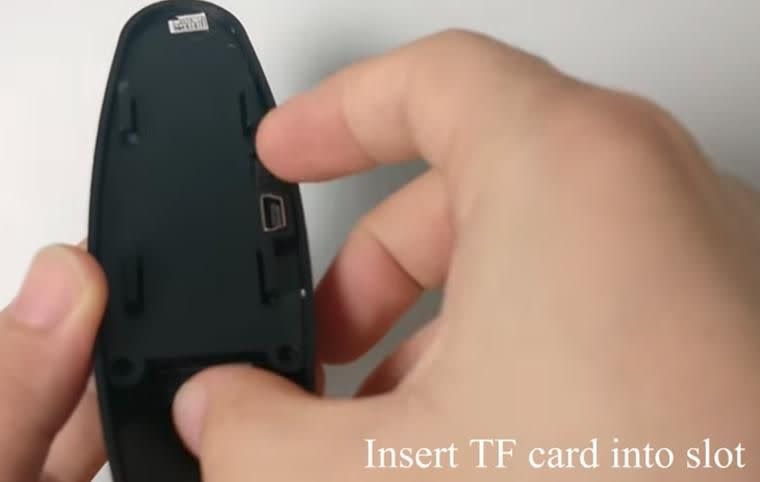 A simple click and the memory card is dispensed. Photo: Youtube/Etech.