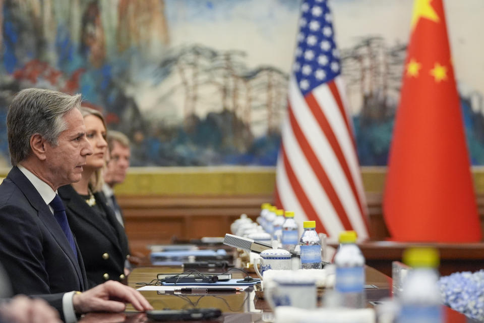 U.S. Secretary of State Antony Blinken, left, reacts during a meeting with China's Foreign Minister Wang Yi at the Diaoyutai State Guesthouse, Friday, April 26, 2024, in Beijing, China. (AP Photo/Mark Schiefelbein, Pool)
