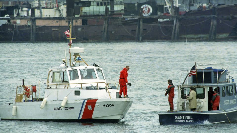 File photo of Boston Police and Coast Guard boats searching the water for the body of Charles Stuart. - Elise Amendola/AP