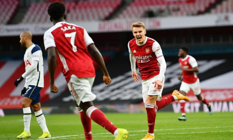 Ødegaard celebrates scoring the equaliser against Tottenham last March in a game Arsenal went on to win 2-1.