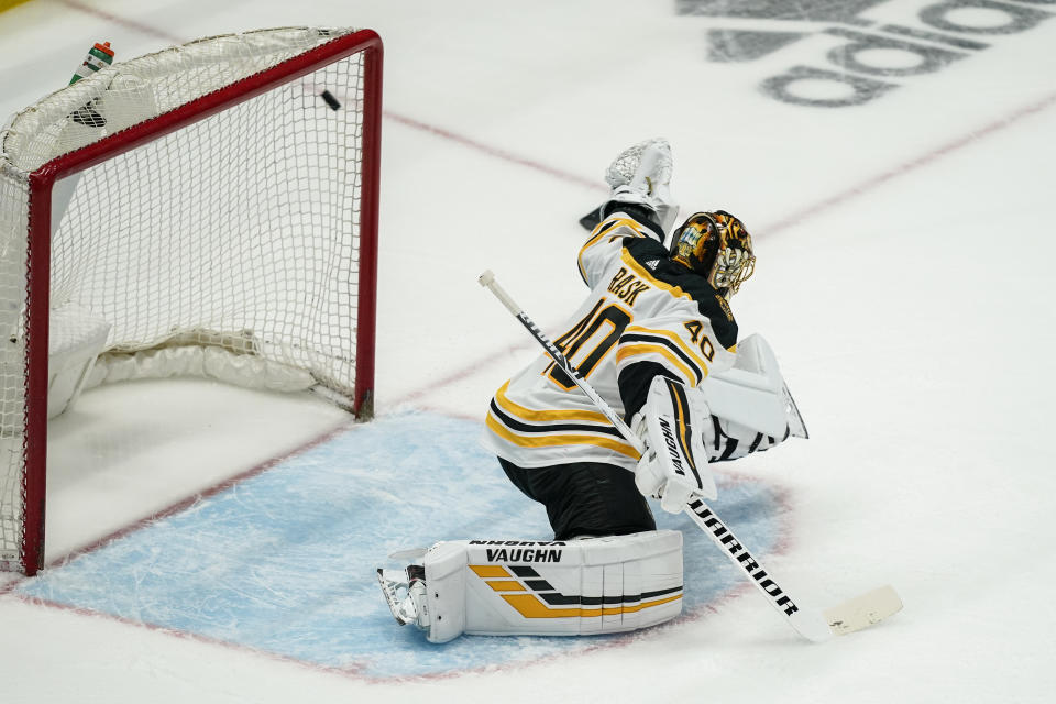 Boston Bruins goaltender Tuukka Rask (40) cannot stop a goal by Washington Capitals right wing Garnet Hathaway during the third period of Game 2 of an NHL hockey Stanley Cup first-round playoff series Monday, May 17, 2021, in Washington. (AP Photo/Alex Brandon)