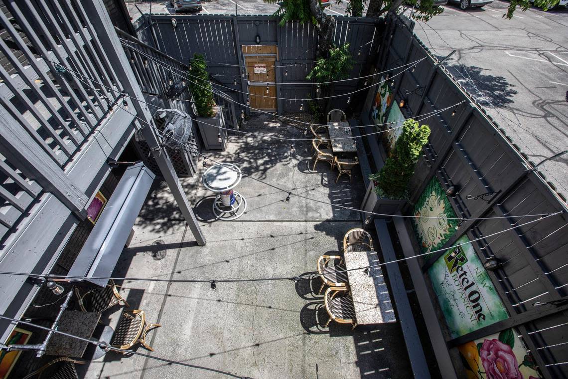 Tables spaced apart on the patio at Soundbar at 208 South Limestone in Lexington, Ky., on Thursday, May 28, 2020.