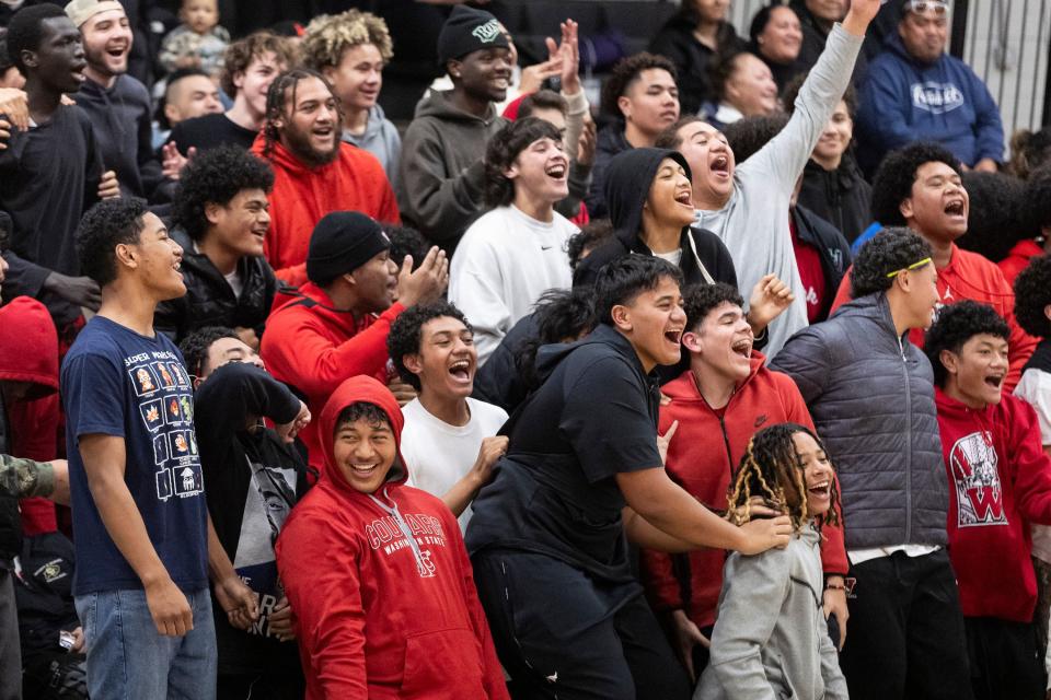 Spectators at West High School cheer for the West Panthers during a game against the Salem Hills Skyhawks in Salt Lake City on Thursday, Feb. 22, 2024. | Marielle Scott, Deseret News