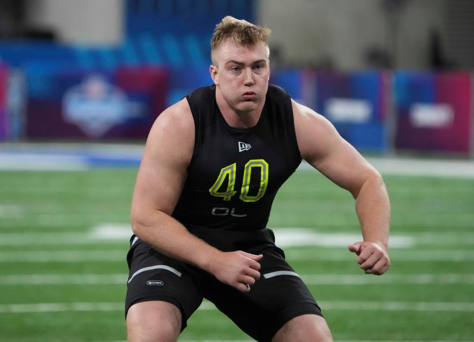 Mar 4, 2022; Indianapolis, IN, USA; Central Michigan offensive lineman Bernhard Raimann (OL40) goes through drills during the 2022 NFL Scouting Combine at Lucas Oil Stadium.