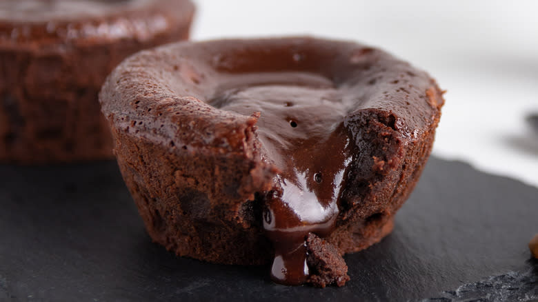 Warm lava cake flowing with chocolate