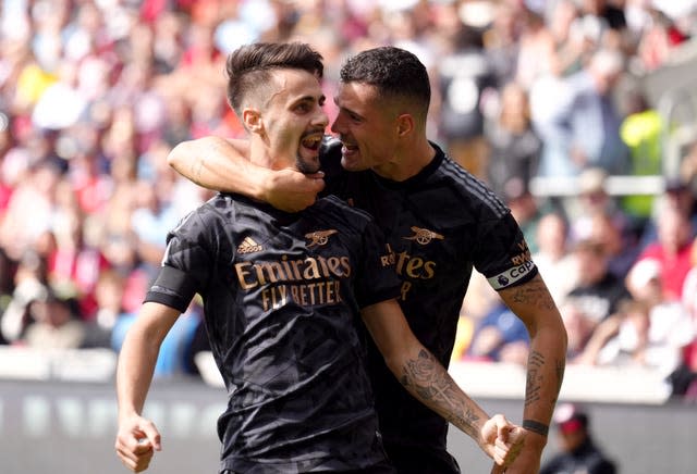 Fabio Vieira, left, wrapped up Arsenal's win at Brentford (John Walton/PA)