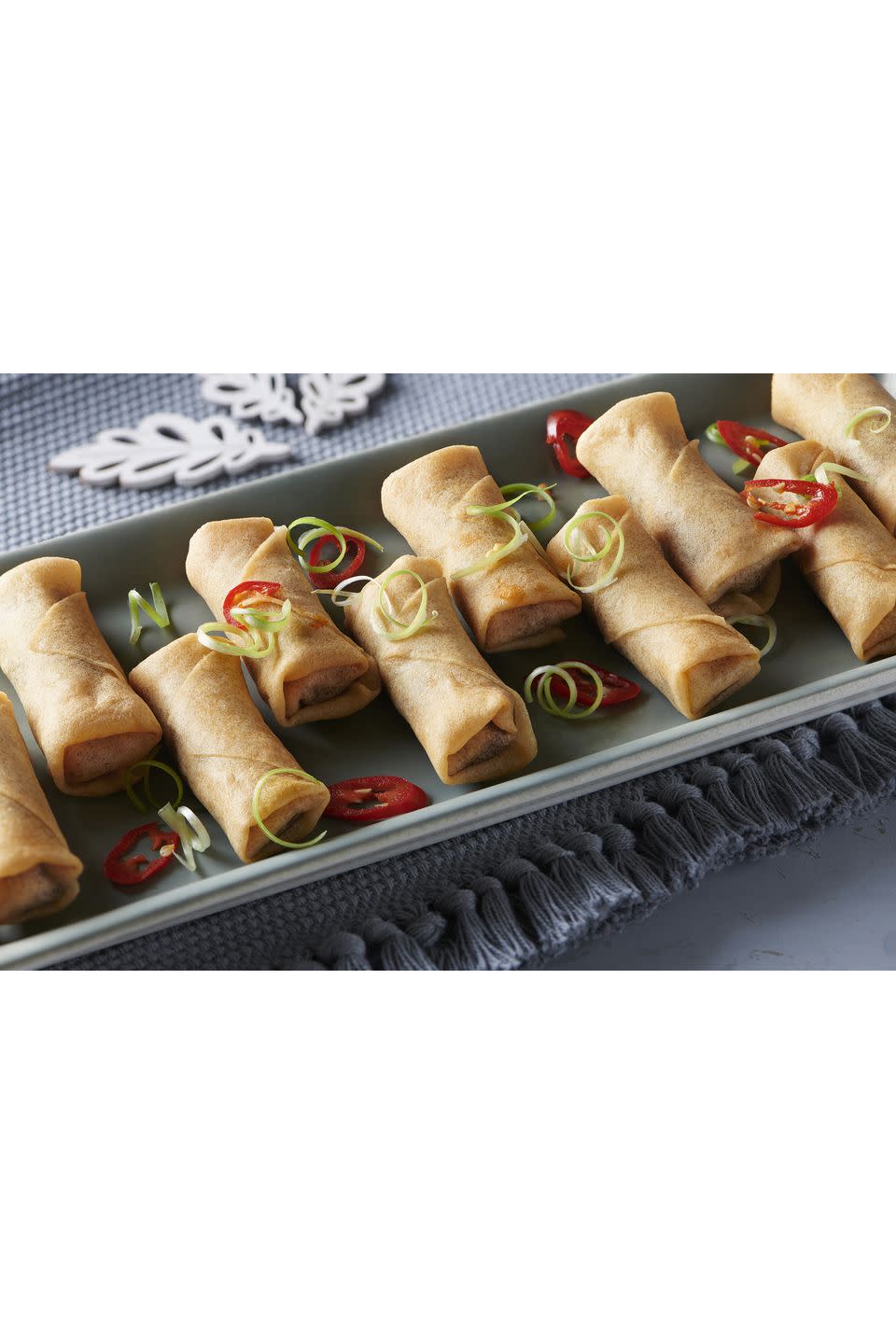 <p>Neatly wrapped crispy spring rolls with a sweet, 5 spice and hoisin aroma. The filling smells meaty and sweet. It is deliciously juicy and moist whilst being packed with an anise and 5 spice jackfruit filling that is well seasoned.<br></p><p><strong><a class="link " href="https://shop.coop.co.uk/" rel="nofollow noopener" target="_blank" data-ylk="slk:AVAILABLE IN STORE ONLY;elm:context_link;itc:0;sec:content-canvas">AVAILABLE IN STORE ONLY</a></strong> <strong>Co-op, £2.25 for 180g (pack 10)</strong></p>