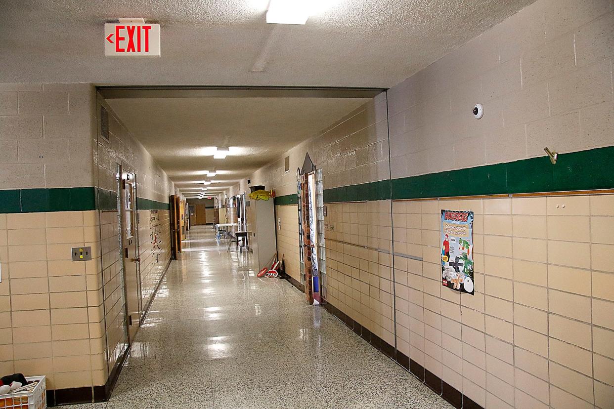 This is the hallway of one of the classroom wings at Taft Elementary School seen here on Tuesday, Jan. 18, 2022. Taft will receive interior updates this summer, including receiving  color-coordinated hallways.