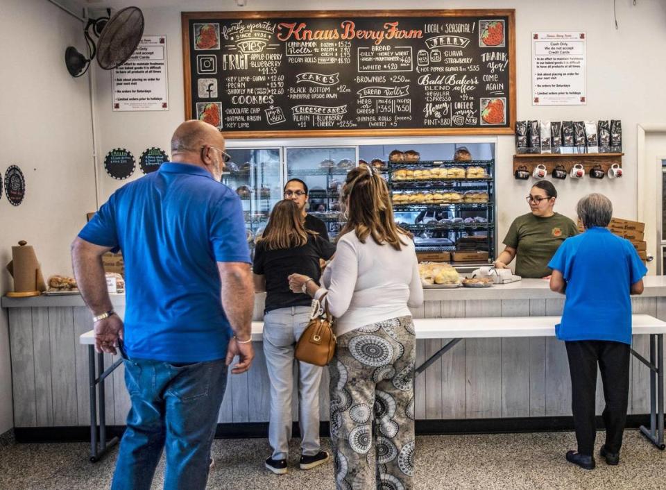 Customers line up for cinnamon rolls, bread, jams and pies and other homemade goodies at Knaus Berry Farm in Homestead. Pedro Portal/pportal@miamiherald.com