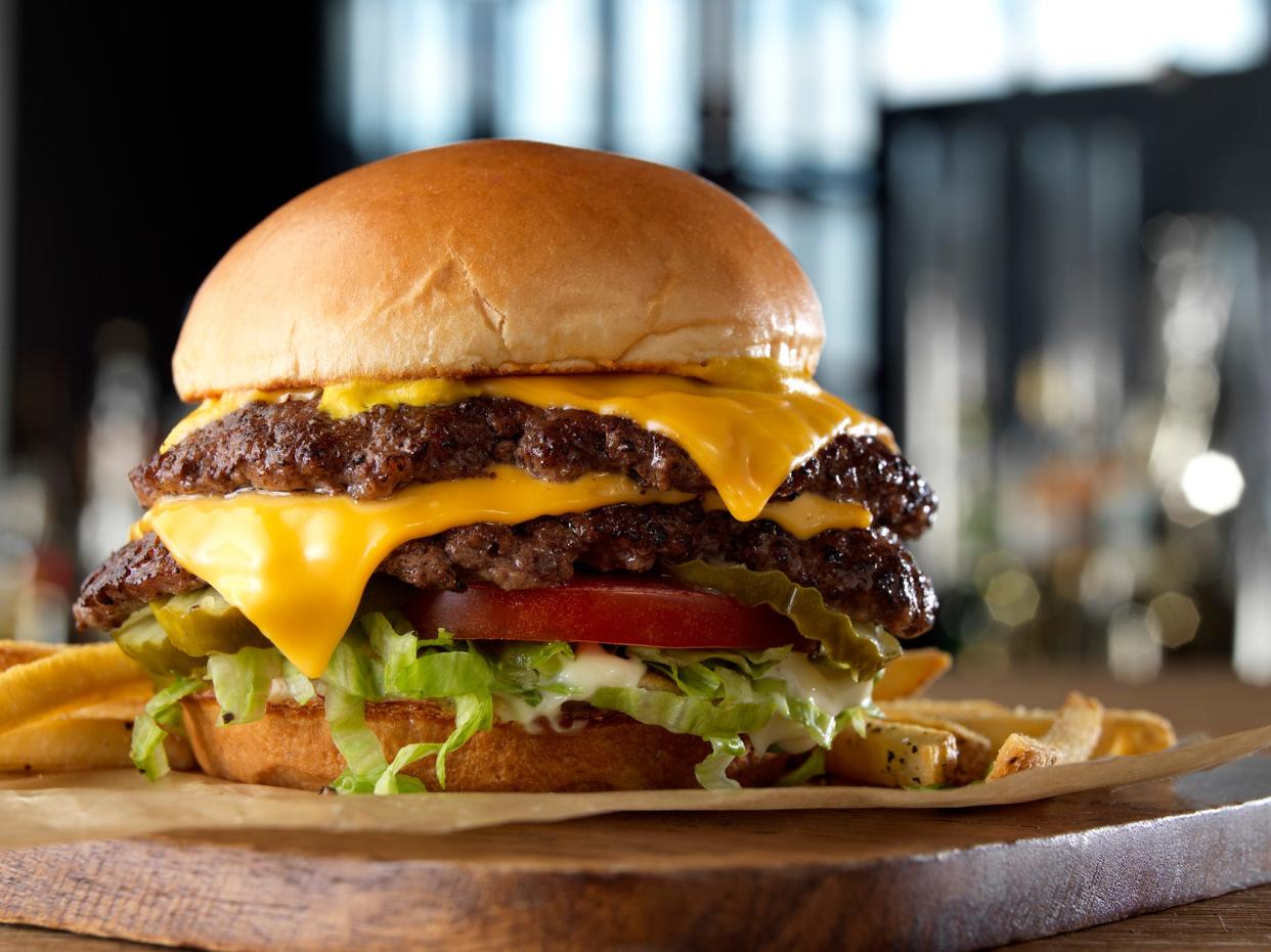 Buffalo Wild Wings has a deal available for a limited time earning you six boneless wings for $1 when you buy any of its double-stacked burgers including the Smoked Brisket Burger and Bacon Smashed Hatch Chile Burger.