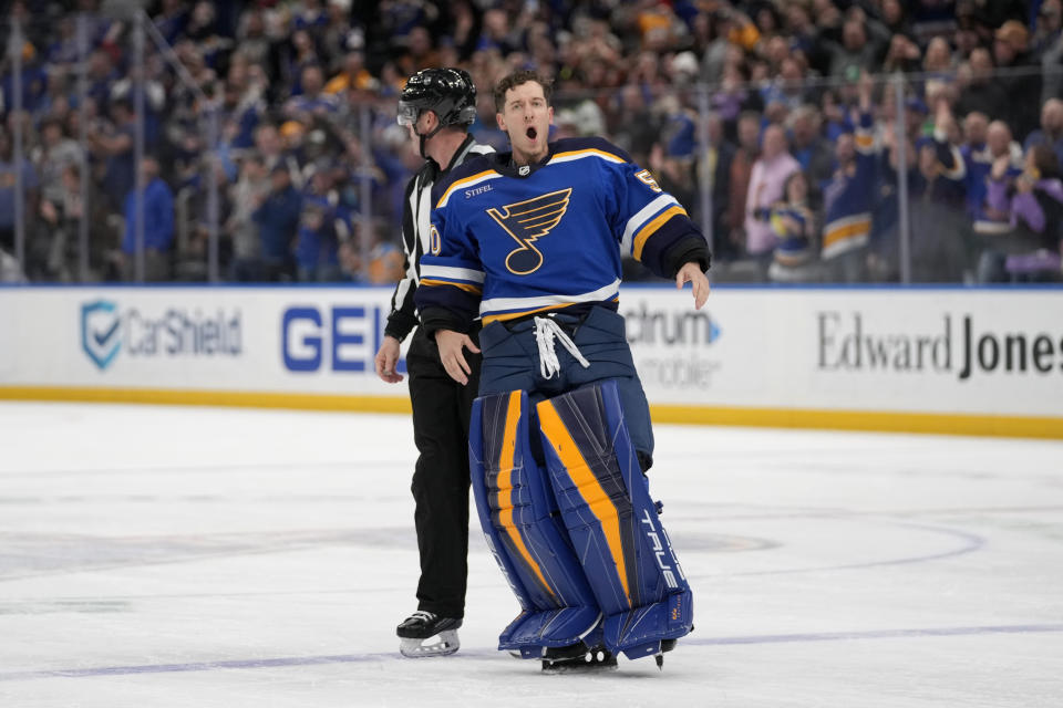 St. Louis Blues goaltender Jordan Binnington reacts after receiving a penalty during the second period of an NHL hockey game against the Minnesota Wild Wednesday, March 15, 2023, in St. Louis. (AP Photo/Jeff Roberson)