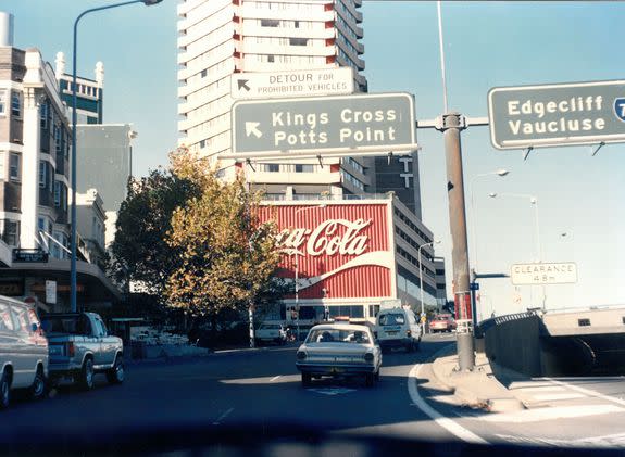 Shot of Coke sign at Kings Cross, pre-1986.