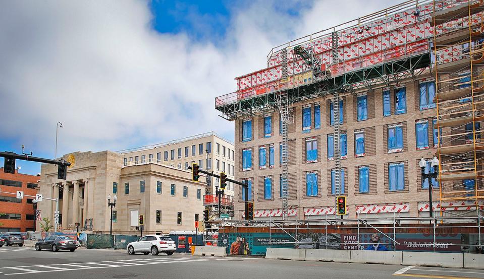 The Center and Stone residential developments on Hancock Street in Quincy Center include the former Masonic Lodge, left, and a new building replacing a Citizens Bank. Monday, Aug. 28, 2023.