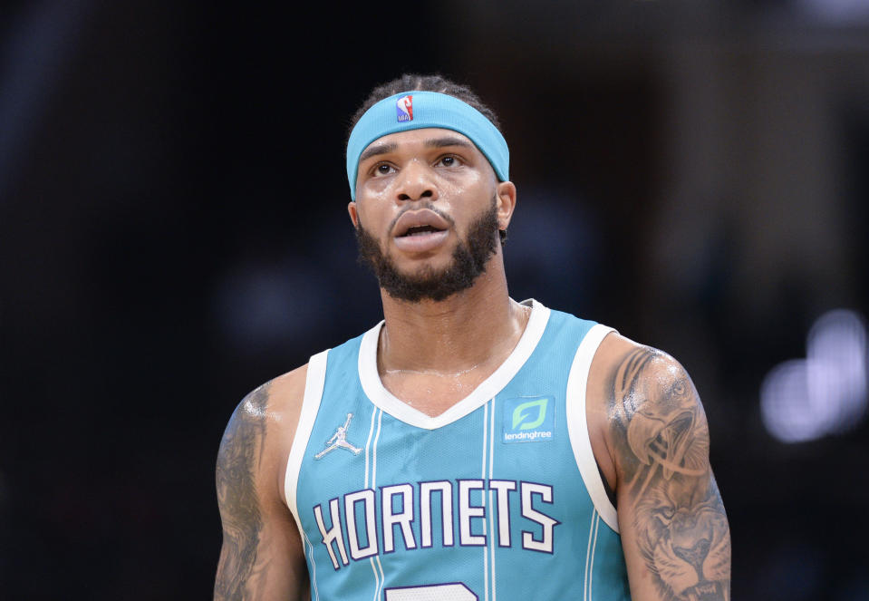 March 23, 2022;  Charlotte, North Carolina, USA;  Charlotte Hornets forward Miles Bridges (0) looks on in a time out during the first half against the New York Knicks at the Spectrum Center.  Mandatory Credit: Sam Sharpe - USA TODAY Sports