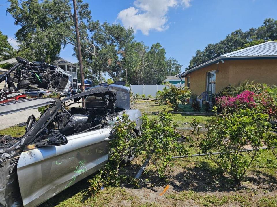 Bradenton police say two stolen vehicles crashed in the 700 block of 12th Ave. W., with one engulfed in flames and the other on its side after hitting the roof of a home.