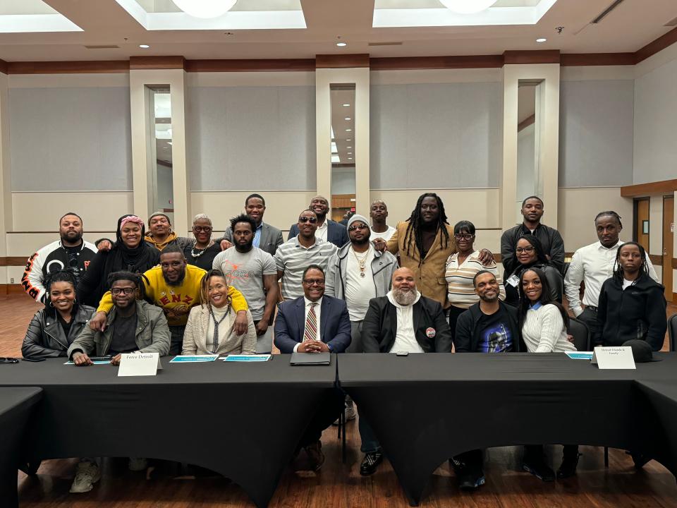 Detroit Deputy Mayor Todd Bettison (center) on March 12, 2024 at the Northwest Activities Center surrounded by numerous members of ShotStopper organizations Detroit Friends and Family and Force Detroit, along with other city officials.