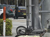 FILE - In this Jan. 23, 2019 photo, Broward Sheriff's Office Deputies work the scene of a accident involving a Brightline Train and a person riding a bicycle in Oakland Park, Fla. Florida higher-speed passenger train service tied to Richard Branson’s Virgin Group has the worst per-mile death rate in the U.S. The first death involving a Brightline train happened in July 2017 during test runs. An Associated Press analysis of Federal Railroad Administration data shows that since then, 40 more have been killed. That amounts to a rate of more than one a month and about one for every 29,000 miles (47,000 kilometers) the trains have traveled since the first death. (Joe Cavaretta/South Florida Sun-Sentinel via AP)