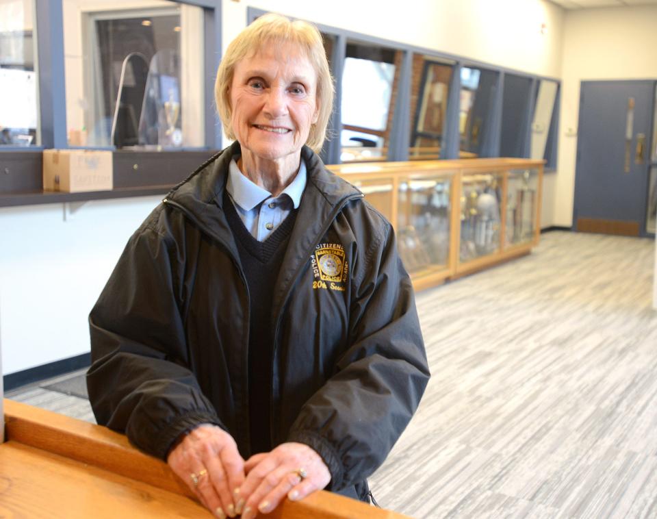 Volunteer Kathy Strudwick at the Barnstable police headquarters in Hyannis where she volunteers staffing the front desk. Barnstable has been named the country's happiest place to retire in a study conducted by finance company SoFi. A "vibrant social scene," high percentage of people aged 65 and older and low poverty rate earned the Cape Cod town its title.