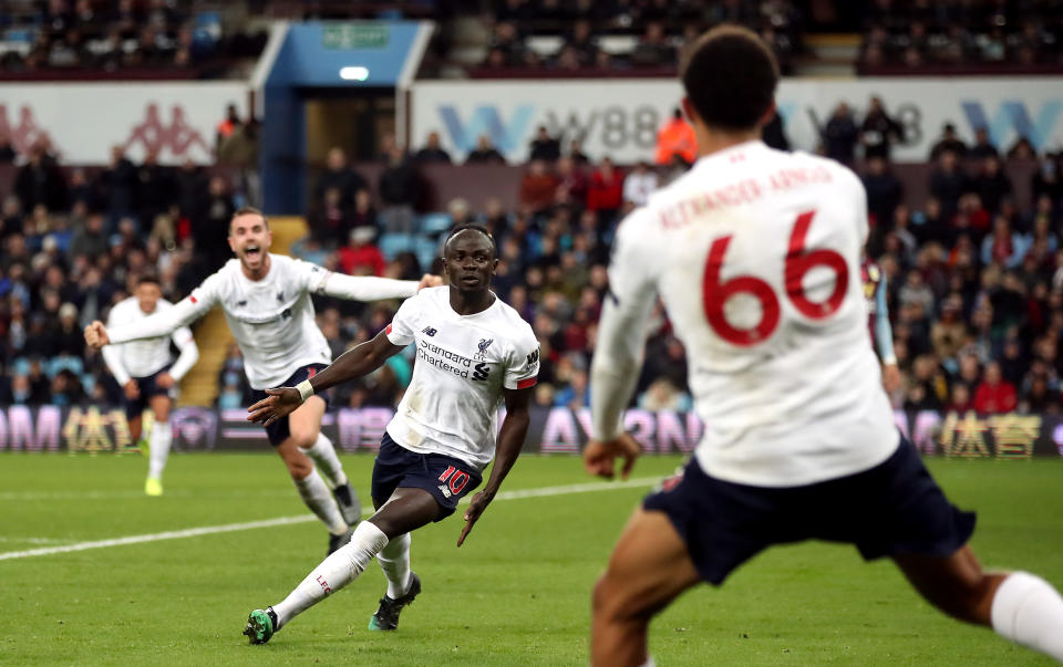 Sadio Mane (center) celebrates after scoring a huge winner for Liverpool against Aston Villa. (Getty Images)