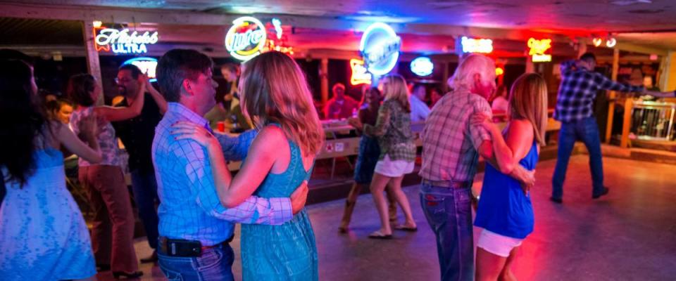 Austin, Texas - June 13, 2014: People dancing country music in the Broken Spoke dance hall in Austin, Texas, USA