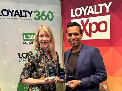 Avion Rewards team members Carolyn Hynds and Karim Rahemtulla celebrate the program’s three wins at the Loyalty360 Awards in Orlando, Florida on June 6, 2024. (CNW Group/RBC Royal Bank)