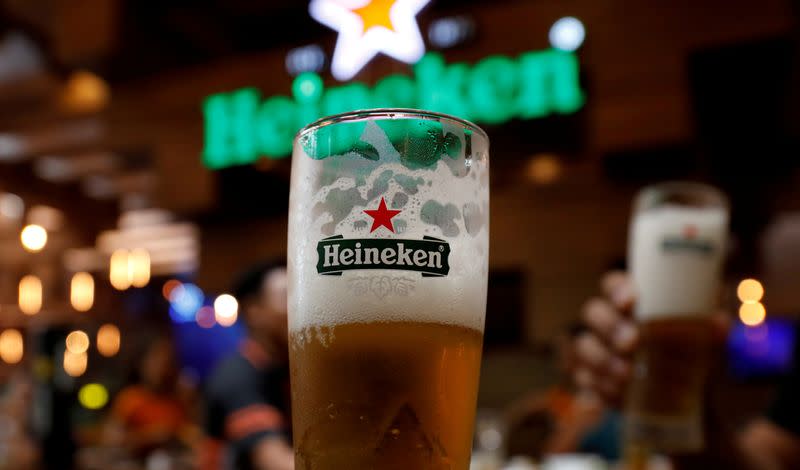 FILE PHOTO: Glasses of Heineken beer are seen at a restaurant in Hanoi