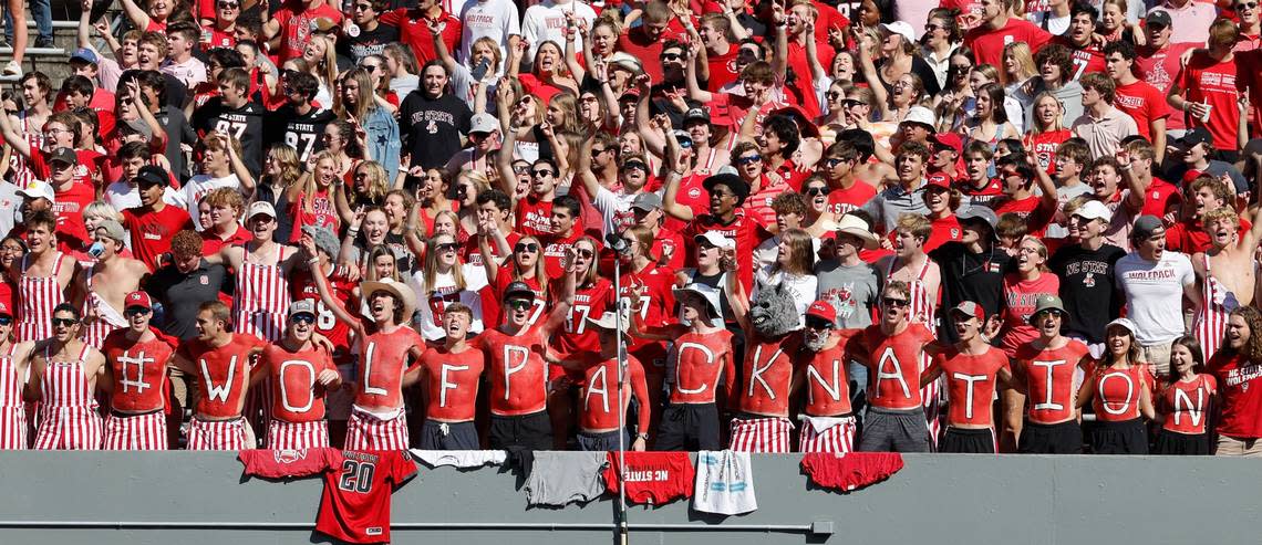 N.C. State fans sing the alma mater before the Wolfpack’s game against Clemson at Carter-Finley Stadium in Raleigh, N.C., Saturday, Oct. 28, 2023. Ethan Hyman/ehyman@newsobserver.com