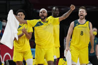 Australia's Patty Mills, left, and Matthew Dellavedova (8) celebrate a score against Argentina during a men's basketball quarterfinal round game at the 2020 Summer Olympics, Tuesday, Aug. 3, 2021, in Saitama, Japan. (AP Photo/Eric Gay)