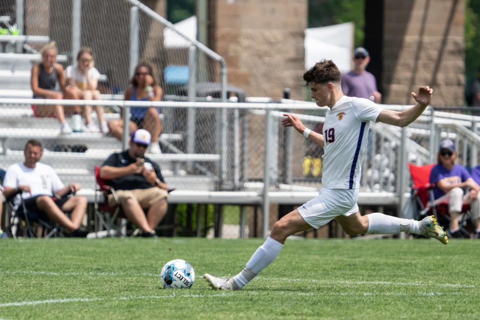 Nevada's Kent Sponseller kicks the ball across the field during the Class 2A state soccer semifinal between Nevada and Davenport Assumption on Thursday, June, 1 2023, at the Cownie Soccer Park in Des Moines.  