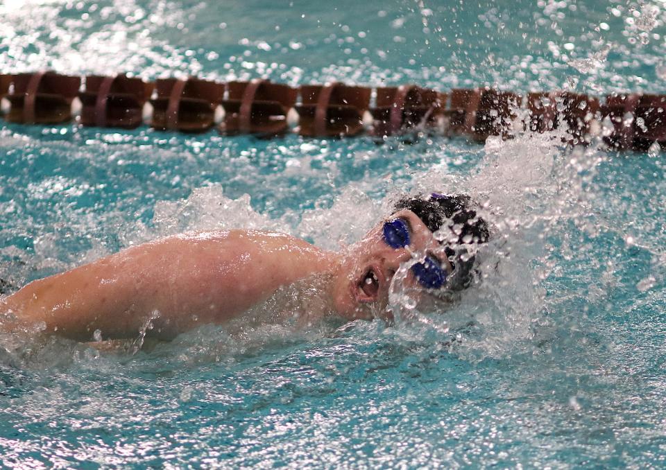 Burlington’s Aiden Woodsmall in the 200-yard freestyle against United Township Friday in Burlington.