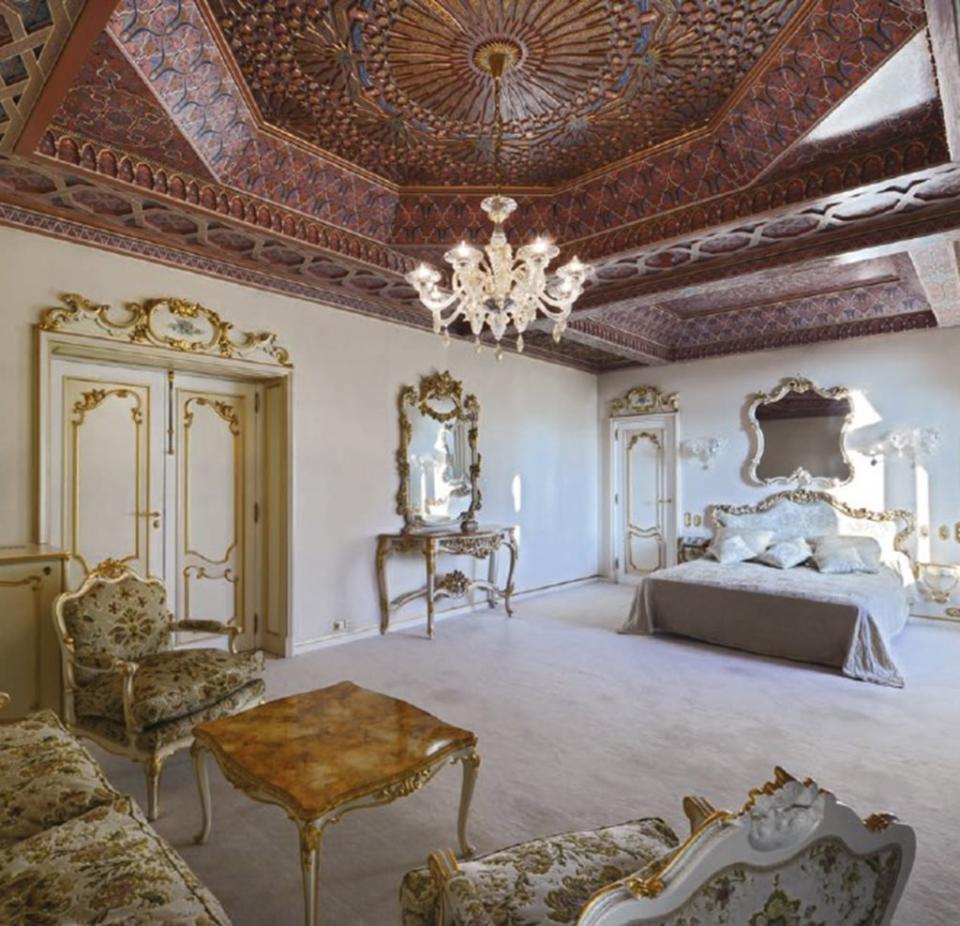 The main house has 17 bedrooms, with this one blending French and Moroccan design elements. Whisper Auctions
