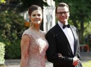 FILE PHOTO - Sweden's Crown Princess Victoria (L) and her fiance Daniel Westling arrive for a Government dinner at the Eric Ericson Hall in Skeppsholmen June 18, 2010, as part of this weekend's wedding celebrations. Sweden's Crown Princess Victoria and her fiance Daniel Westling will be married on June 19, 2010. REUTERS/Fabrizio Bensch